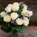Le bouquet candlelight avec la fleur de cire
