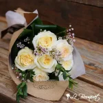 Le bouquet candlelight avec la fleur de cire
