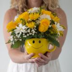 ''Be Happy'' Smile in a Cup Bouquet