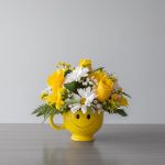 ''Be Happy'' Smile in a Cup Bouquet