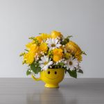 ''Be Happy'' Smile in a Cup Bouquet