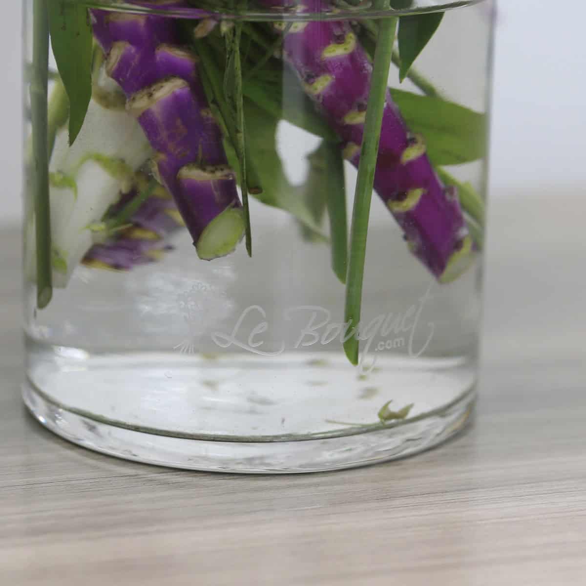 Le Bouquet signature etched glass vase included with Violet Embrace arrangement.