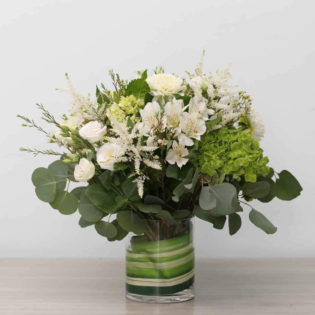 Summer Serenity white and green floral arrangement in glass vase