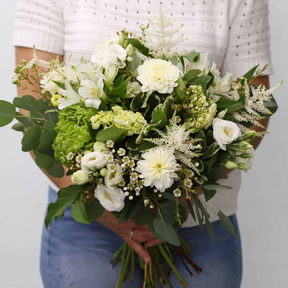 Hand-tied Summer Serenity bouquet with white flowers and fresh greenery