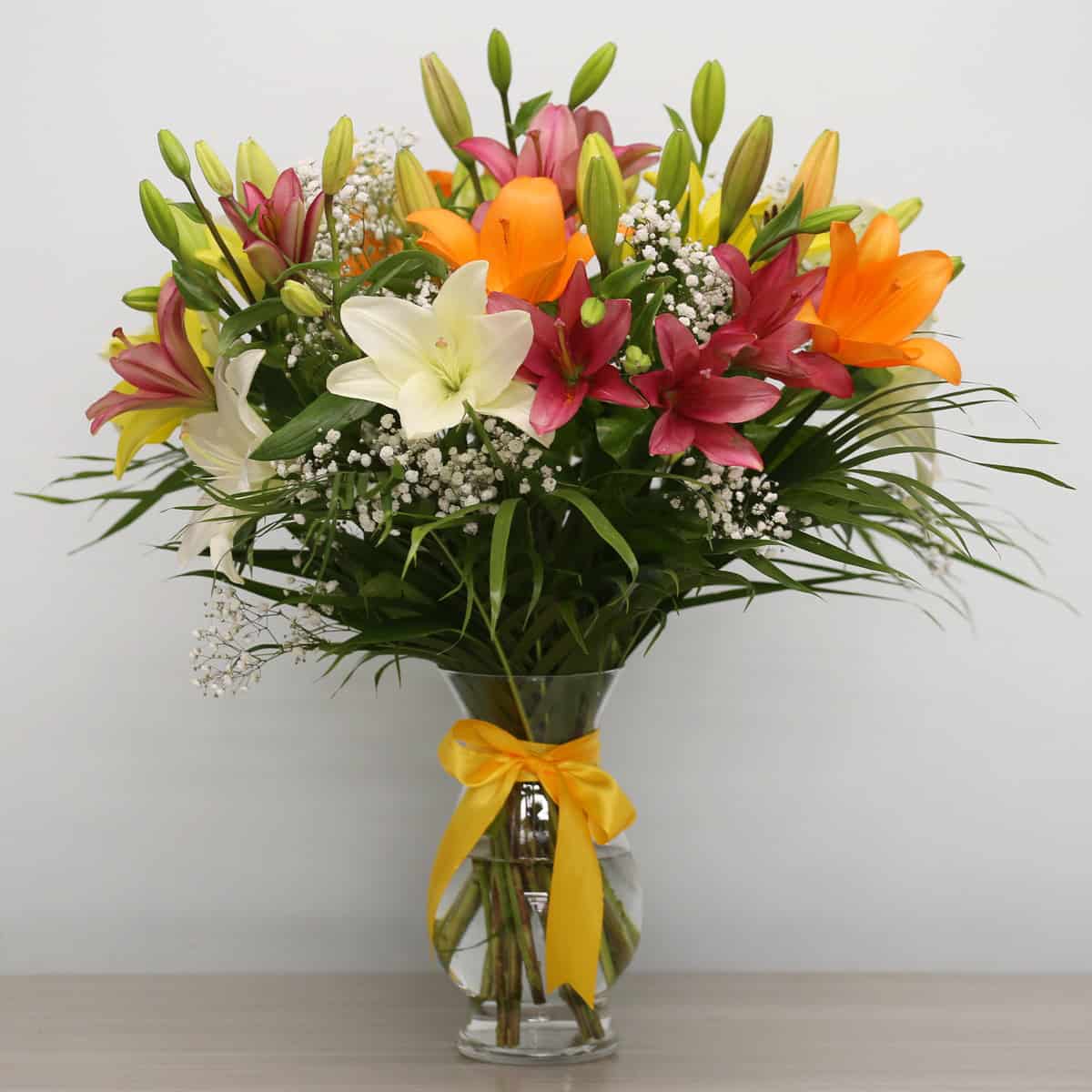 Premium Asiatic lily bouquet in vase with colourful unscented lilies