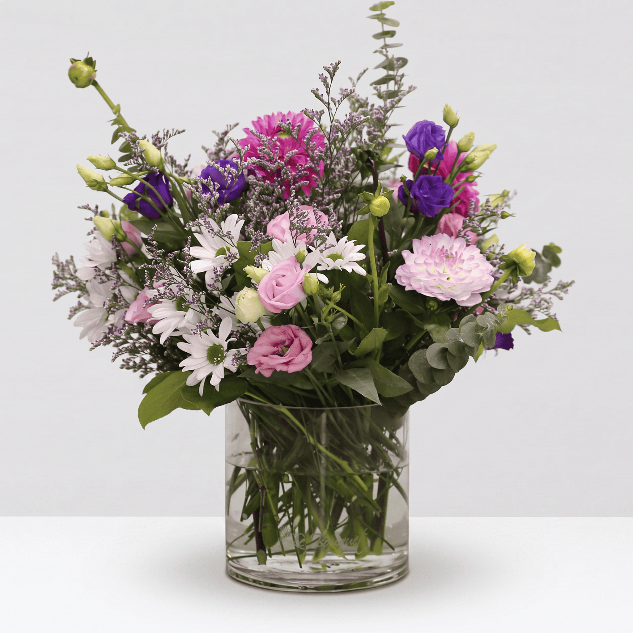 Ariana Bouquet with pink and purple lisianthus, white daisies, caspia, baby eucalyptus and seasonal dahlias